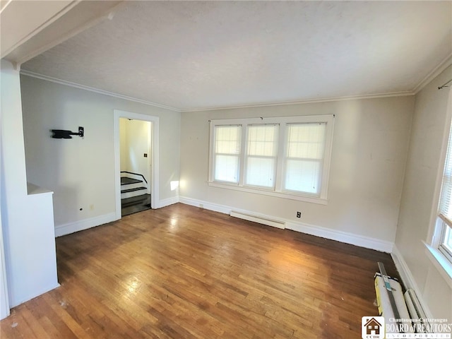 85 Dearborn St, Jamestown, NY 14701 - unfurnished living room with baseboards, crown molding, and wood finished floors