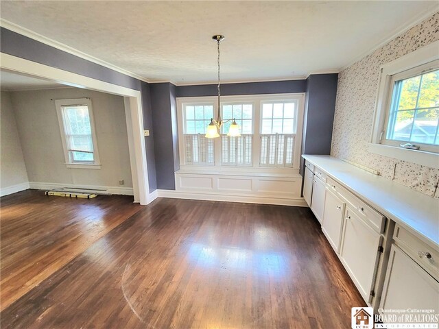 85 Dearborn St, Jamestown, NY 14701 - unfurnished dining area with dark wood-type flooring, crown molding, a chandelier, and baseboards