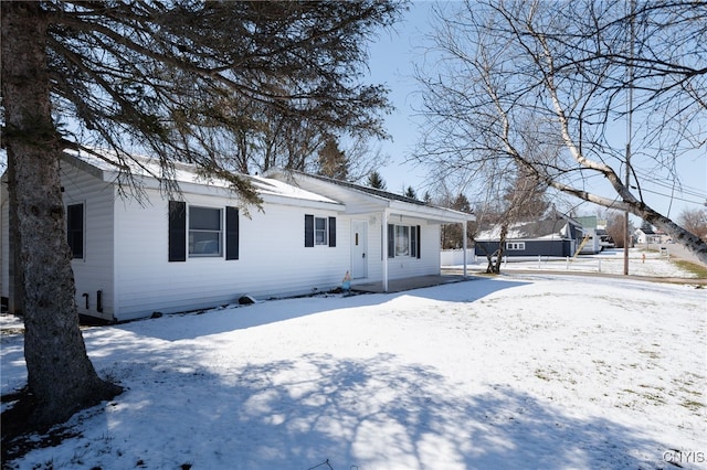 view of snow covered house