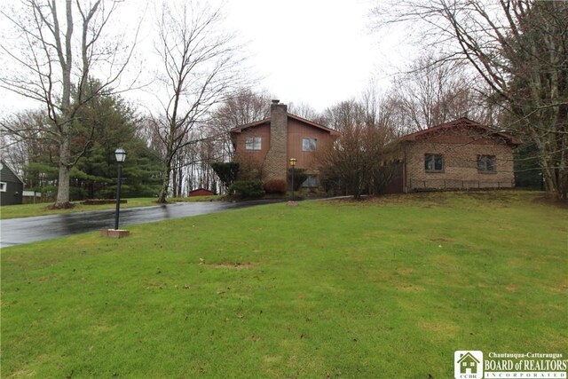117 Westminster Dr, Ellicott, NY 14701 - view of yard featuring driveway