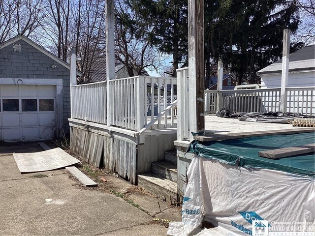 51 Leming St, Dunkirk-City, NY 14048 - view of property exterior featuring a wooden deck and a covered pool