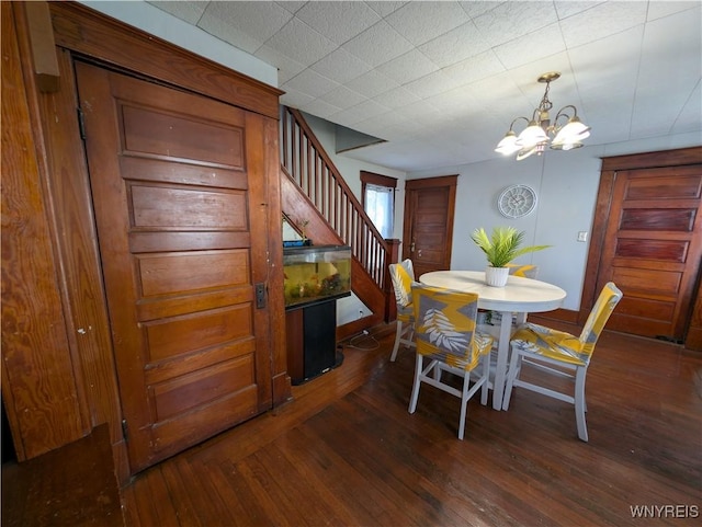 505 Canary St, Dunkirk-City, NY 14048 - dining space with an inviting chandelier, stairs, and hardwood / wood-style floors