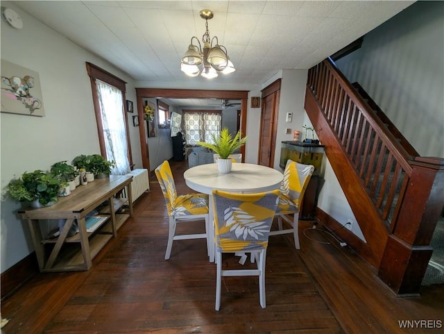 505 Canary St, Dunkirk-City, NY 14048 - dining space featuring baseboards, a chandelier, stairs, dark wood-type flooring, and radiator