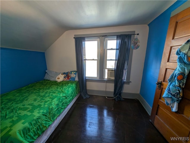 505 Canary St, Dunkirk-City, NY 14048 - unfurnished bedroom featuring dark wood-style flooring, baseboards, and vaulted ceiling