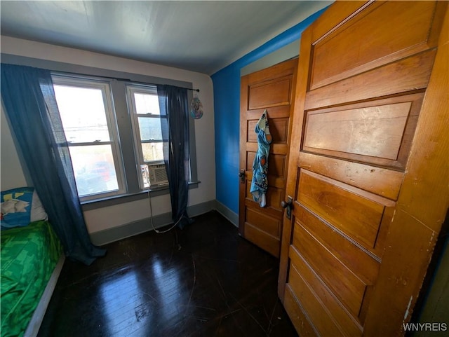 505 Canary St, Dunkirk-City, NY 14048 - entryway featuring baseboards, cooling unit, and dark wood-style floors