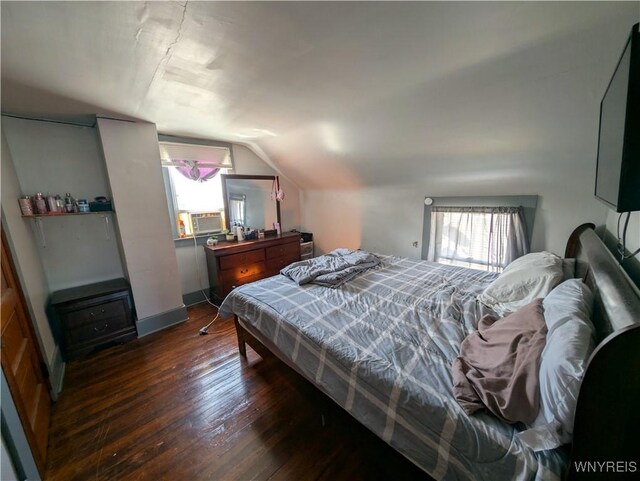 505 Canary St, Dunkirk-City, NY 14048 - bedroom featuring wood-type flooring, baseboards, multiple windows, and vaulted ceiling