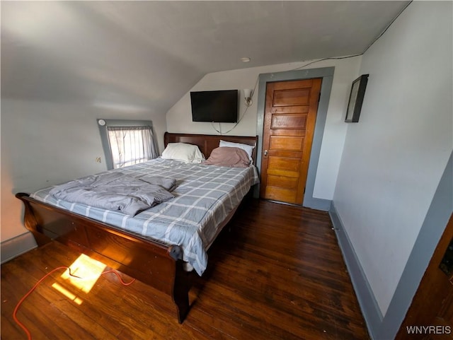 505 Canary St, Dunkirk-City, NY 14048 - bedroom with lofted ceiling, baseboards, and wood finished floors