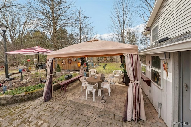 1465 Genesee St, Pembroke, NY 14036 - view of patio / terrace featuring outdoor dining area and a gazebo