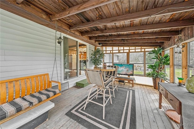 1465 Genesee St, Pembroke, NY 14036 - sunroom / solarium featuring wooden ceiling, wood walls, beam ceiling, and hardwood / wood-style floors
