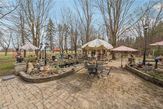 1465 Genesee St, Pembroke, NY 14036 - view of patio / terrace featuring outdoor dining area