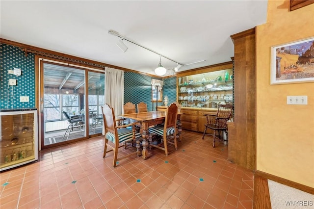 1465 Genesee St, Pembroke, NY 14036 - dining room with rail lighting and tile patterned floors