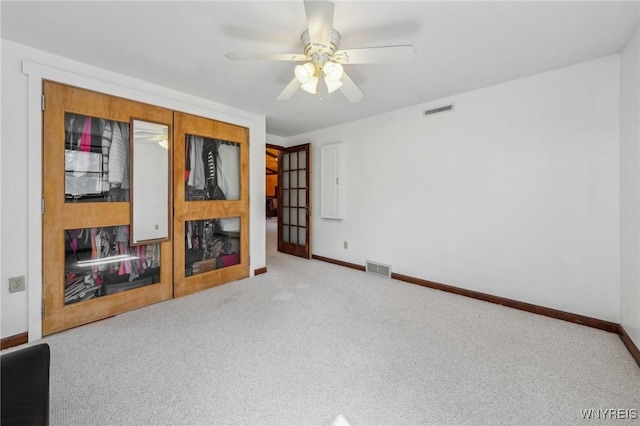1465 Genesee St, Pembroke, NY 14036 - unfurnished living room with baseboards, carpet flooring, and visible vents