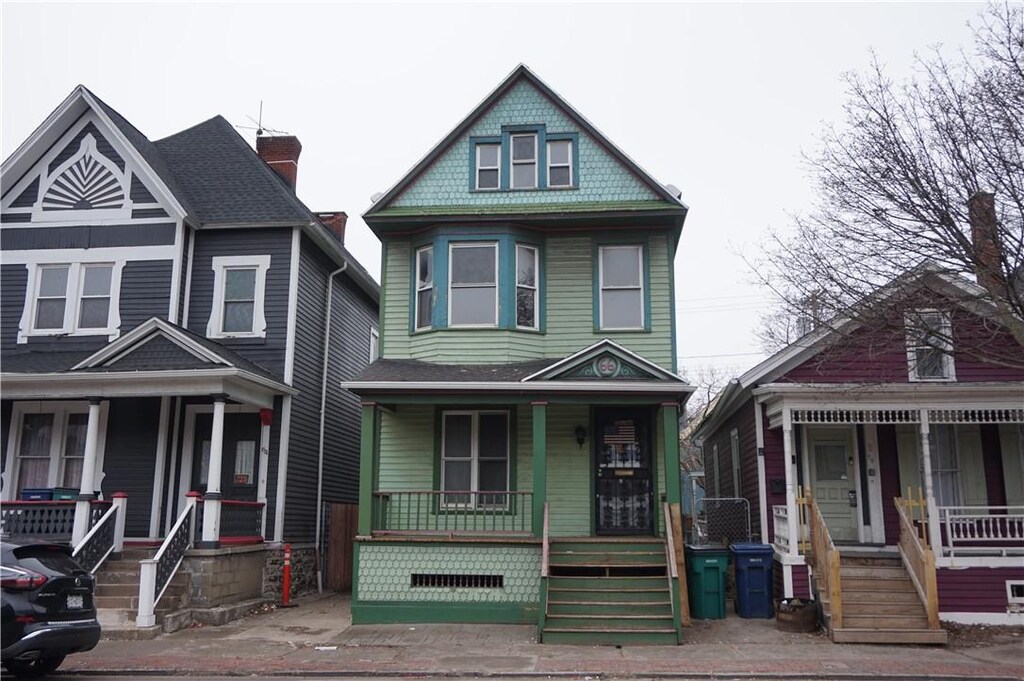 victorian home featuring covered porch