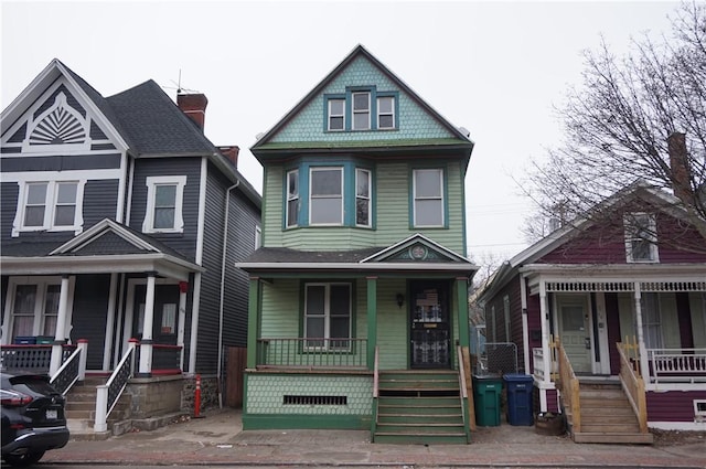 victorian home featuring covered porch