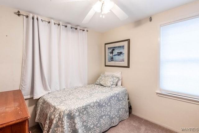 bedroom with carpet flooring and a ceiling fan