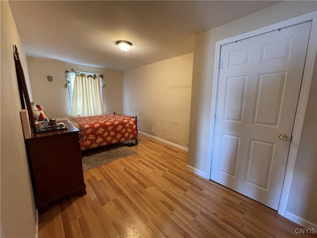 422 N James St, Rome-Inside, NY 13440 - bedroom with light wood-style floors and baseboards
