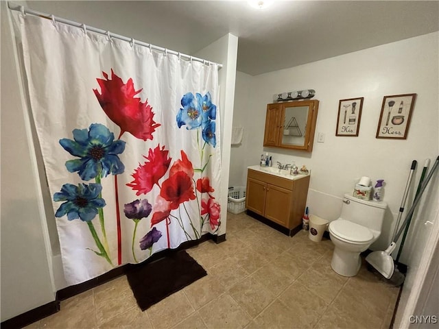 422 N James St, Rome-Inside, NY 13440 - bathroom featuring toilet, vanity, tile patterned flooring, and a shower with curtain