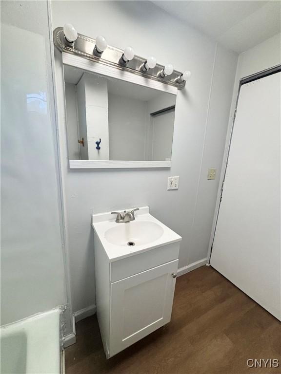 149 River St, Rome-Inside, NY 13440 - bathroom with vanity and wood finished floors