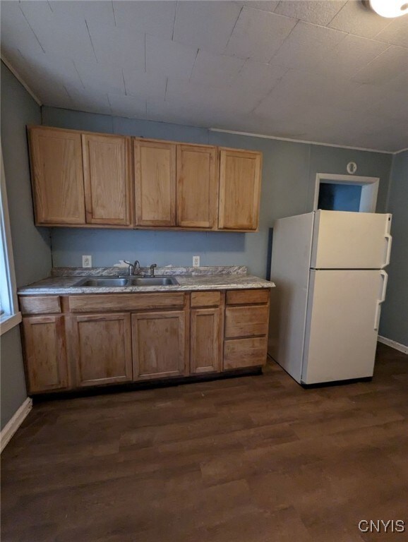 149 River St, Rome-Inside, NY 13440 - kitchen featuring light countertops, dark wood-type flooring, a sink, and freestanding refrigerator