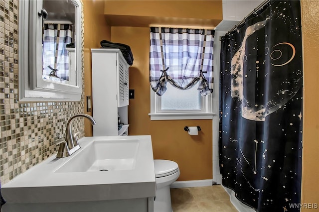 full bathroom featuring vanity, a shower with curtain, toilet, tile patterned floors, and backsplash