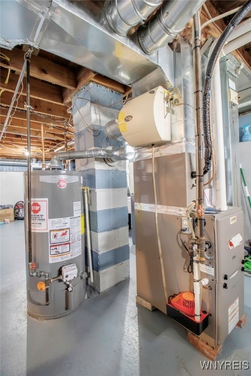 utility room featuring gas water heater