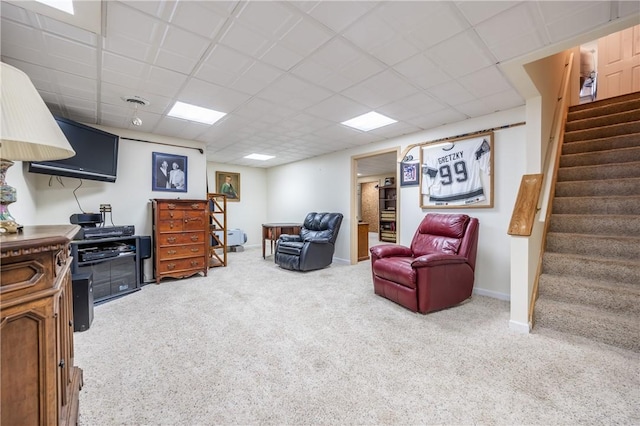 5572 Lakewood Trl, South Bristol, NY 14424 - living room with stairway, a paneled ceiling, and carpet
