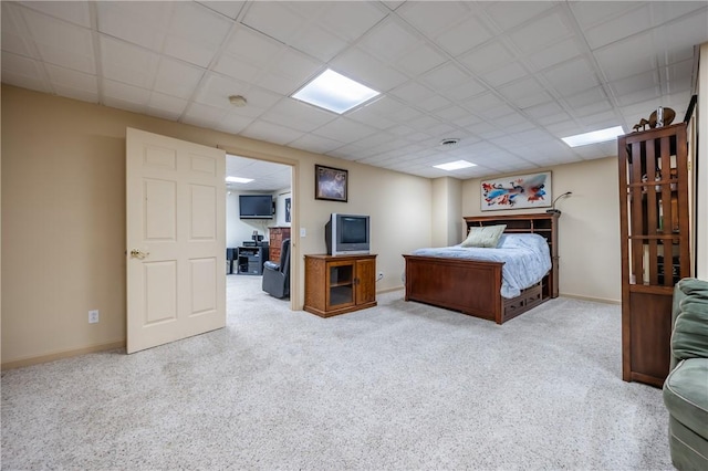 5572 Lakewood Trl, South Bristol, NY 14424 - carpeted bedroom featuring a walk in closet, a paneled ceiling, and baseboards