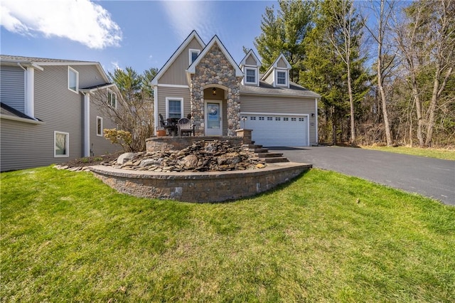5572 Lakewood Trl, South Bristol, NY 14424 - traditional home with aphalt driveway, a garage, stone siding, and a front lawn