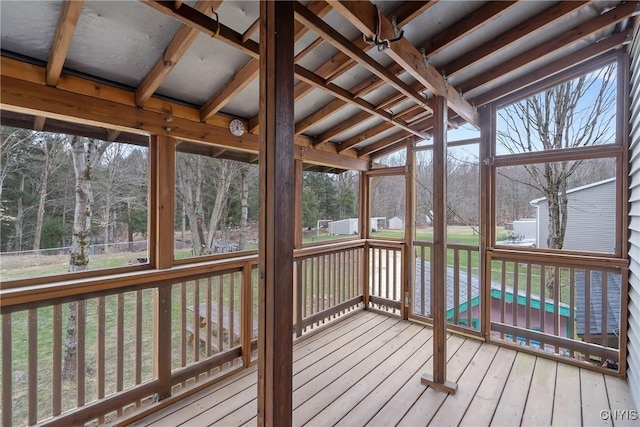 unfurnished sunroom with a healthy amount of sunlight