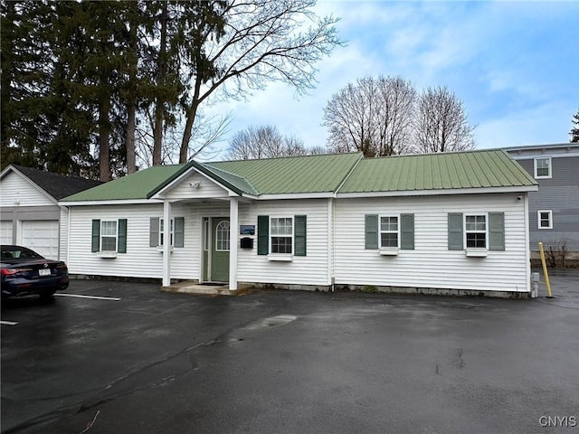 view of front of house featuring metal roof