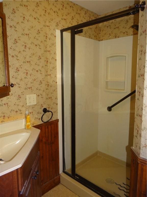 956 Hoffman St, Elmira-City, NY 14905 - full bathroom with vanity, a stall shower, and wallpapered walls