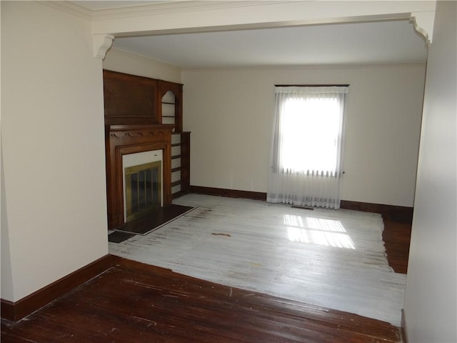 956 Hoffman St, Elmira-City, NY 14905 - unfurnished living room featuring wood-type flooring, a large fireplace, and baseboards