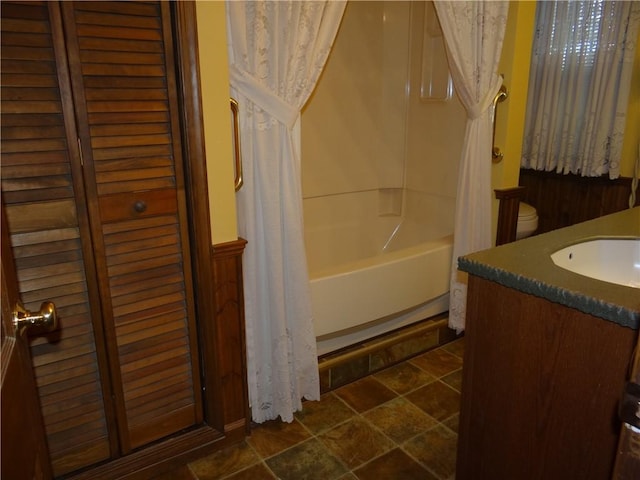 956 Hoffman St, Elmira-City, NY 14905 - bathroom with shower / bathtub combination with curtain, vanity, and stone finish flooring