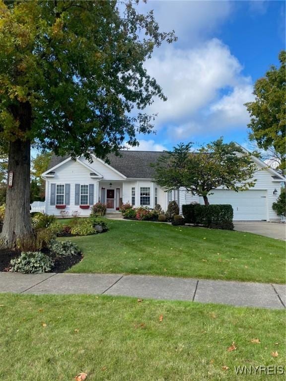 253 Glenvale Rd, Porter, NY 14174 - view of front of home featuring concrete driveway and a front lawn