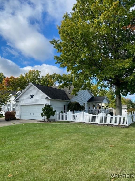 253 Glenvale Rd, Porter, NY 14174 - view of front of house with a front yard and a fenced front yard