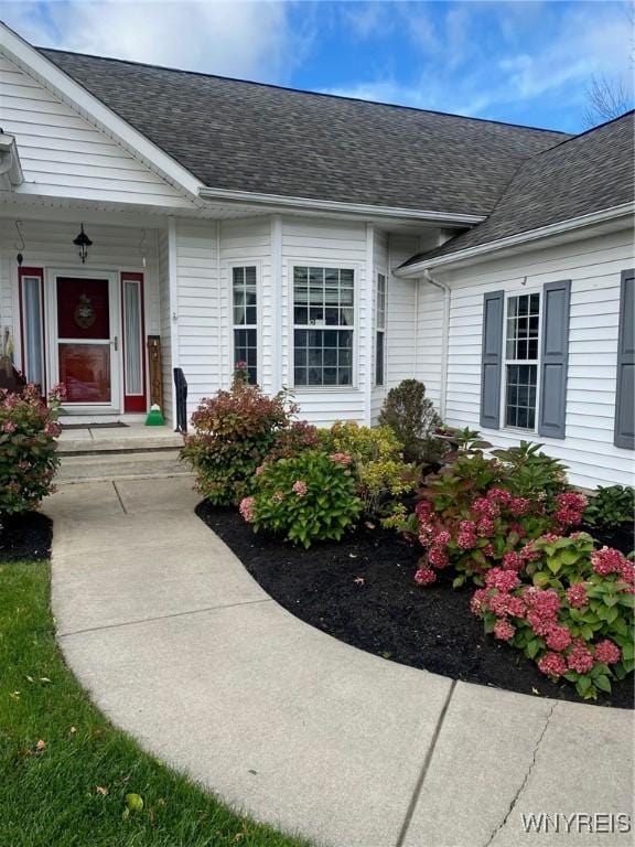 253 Glenvale Rd, Porter, NY 14174 - property entrance with a shingled roof