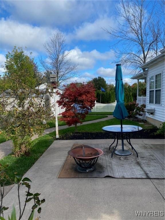 253 Glenvale Rd, Porter, NY 14174 - view of patio with fence and a fire pit
