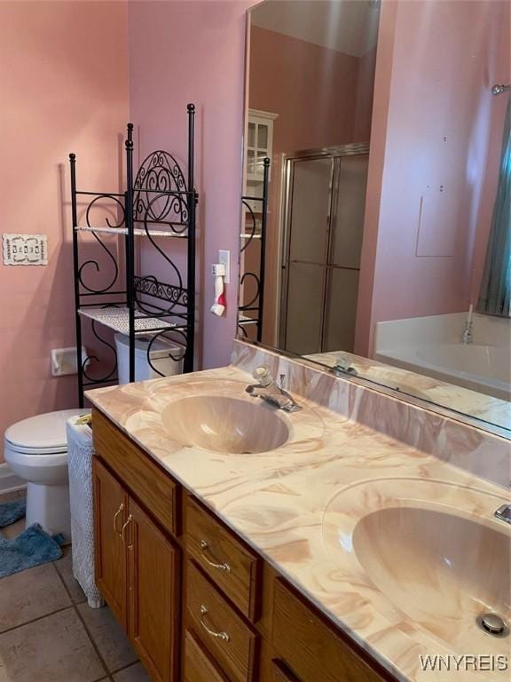 253 Glenvale Rd, Porter, NY 14174 - full bathroom featuring a sink, toilet, double vanity, and a stall shower