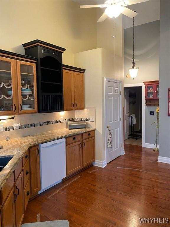 253 Glenvale Rd, Porter, NY 14174 - kitchen featuring tasteful backsplash, a towering ceiling, dark wood-style flooring, a ceiling fan, and dishwasher