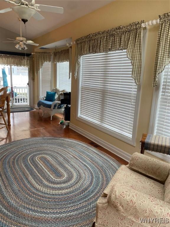 253 Glenvale Rd, Porter, NY 14174 - living area with baseboards, wood finished floors, and ceiling fan