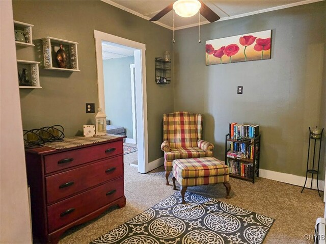 3012 Pleasant Ave, Vienna, NY 13308 - sitting room with light carpet, baseboards, a ceiling fan, and crown molding