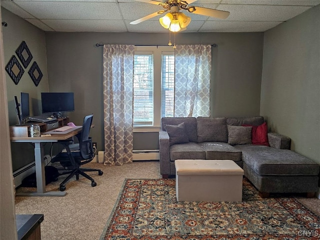 3012 Pleasant Ave, Vienna, NY 13308 - office with a baseboard radiator, a drop ceiling, a ceiling fan, and carpet floors