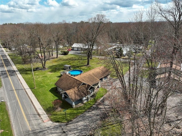 3012 Pleasant Ave, Vienna, NY 13308 - aerial view featuring a wooded view