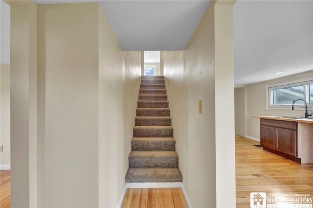 9056 Gross Rd, Cuba, NY 14727 - stairway featuring baseboards and wood finished floors