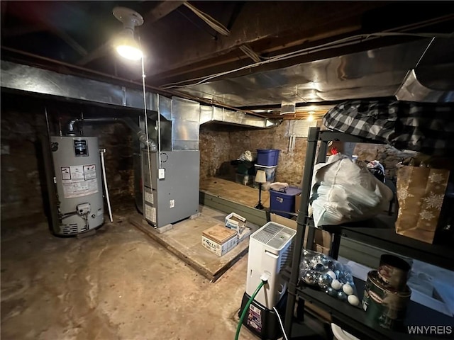 unfinished below grade area with water heater and heating unit