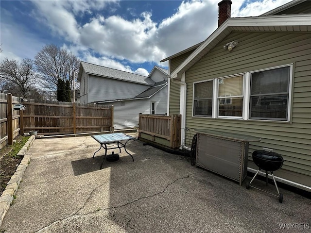 view of patio / terrace with fence