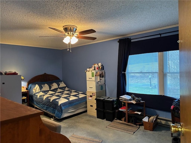 bedroom featuring crown molding, a ceiling fan, carpet, and a textured ceiling
