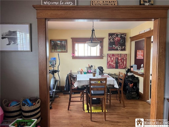 9 Columbia Ave, Ellicott, NY 14701 - dining area featuring wood finished floors