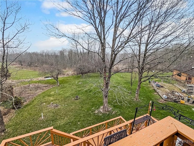 view of yard with a wooden deck