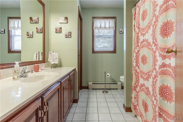 full bath with tile patterned floors, baseboard heating, toilet, vanity, and baseboards